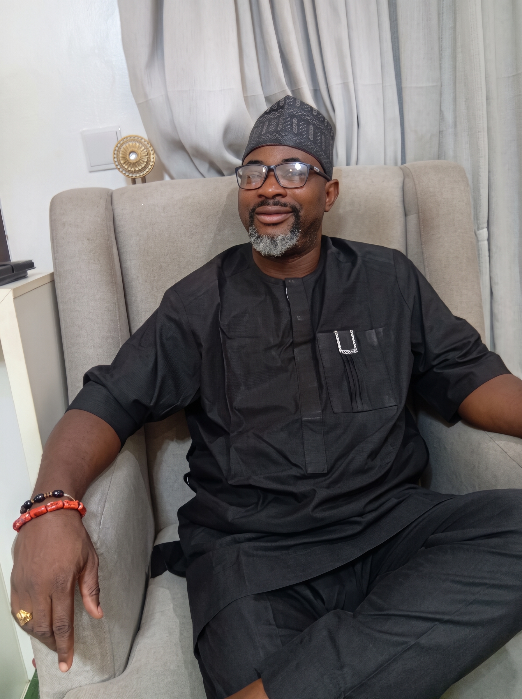 Master Executive Portrait in Black Native Attire